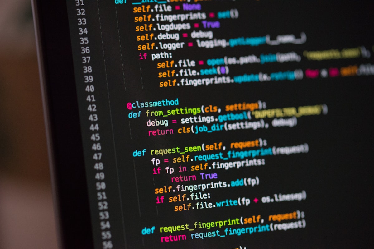 Source code on a computer monitor, close up