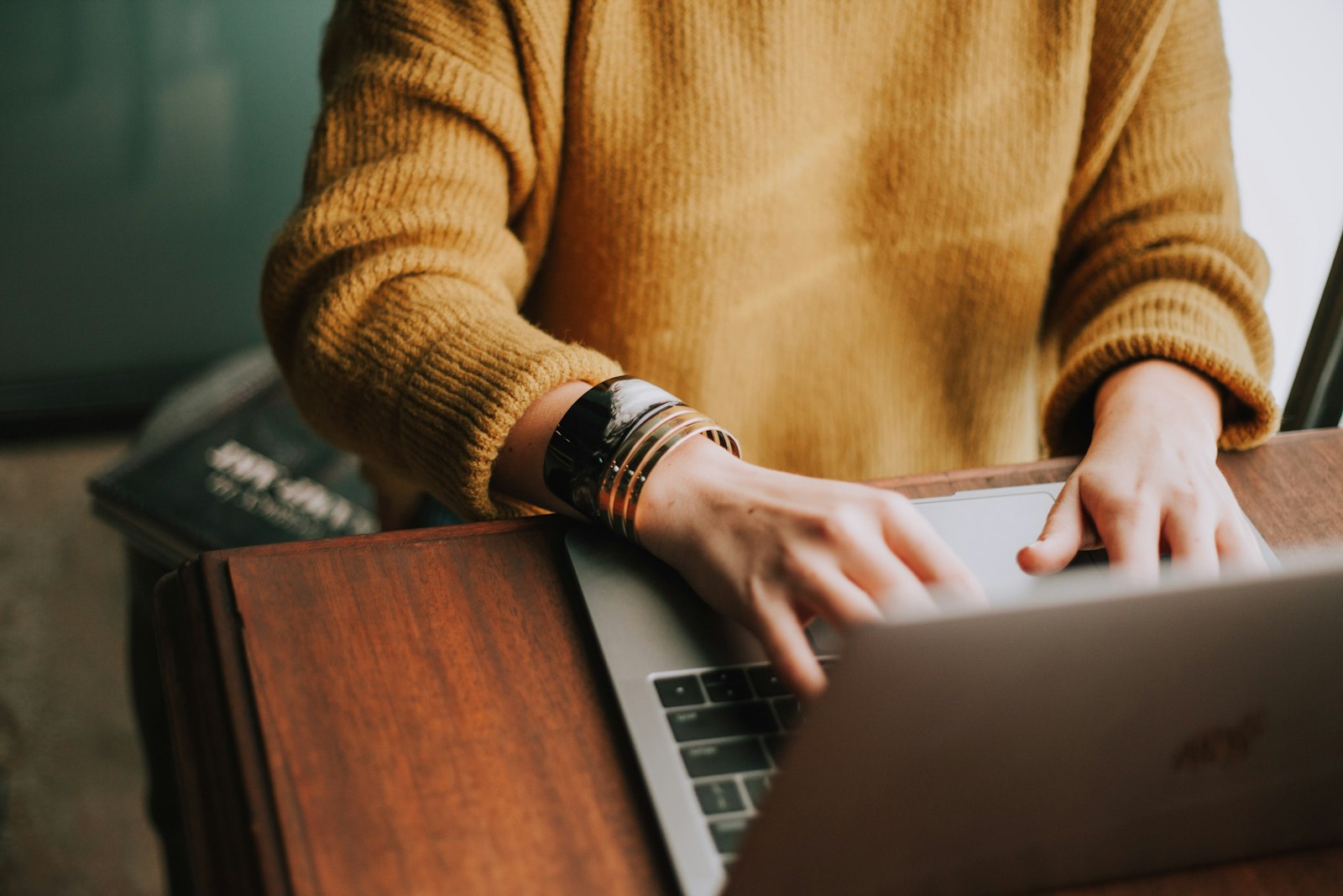 A person working alone on a laptop