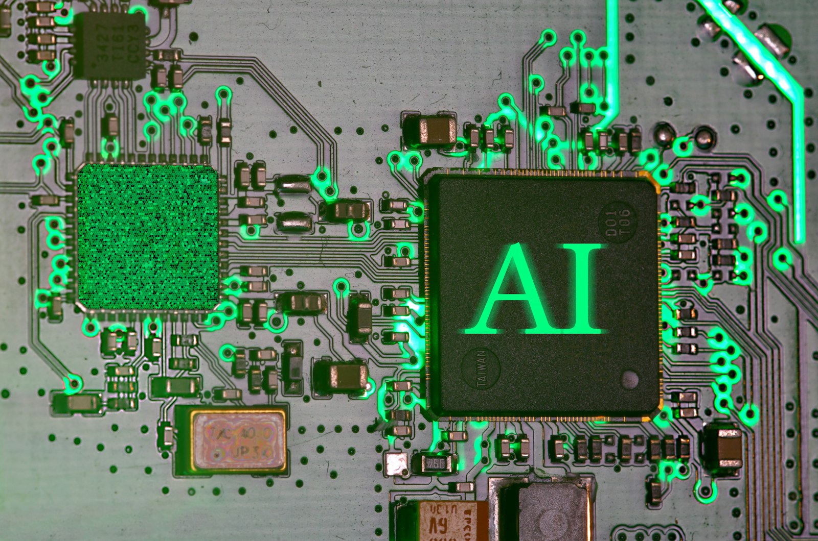 A glowing AI chip on a green circuit board